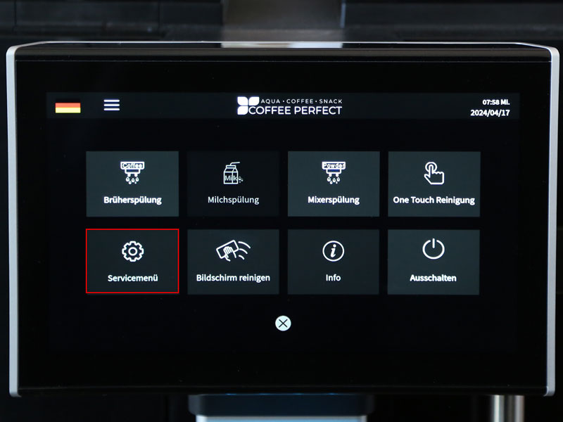 Display eines Kaffeevollautomaten mit hervorgehobener Option zum Aufrufen des Servicemenues.